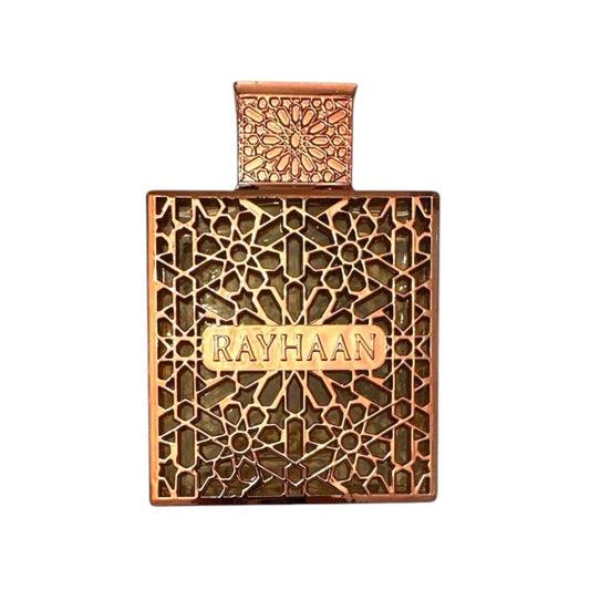 HouseThatCrowBuilt Rayhaan Elixir perfume sample decant next to the original ornate copper-toned glass bottle